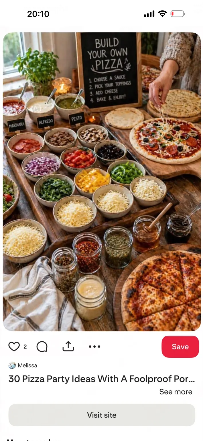 A table of sauces, toppings and freshly made pizzas