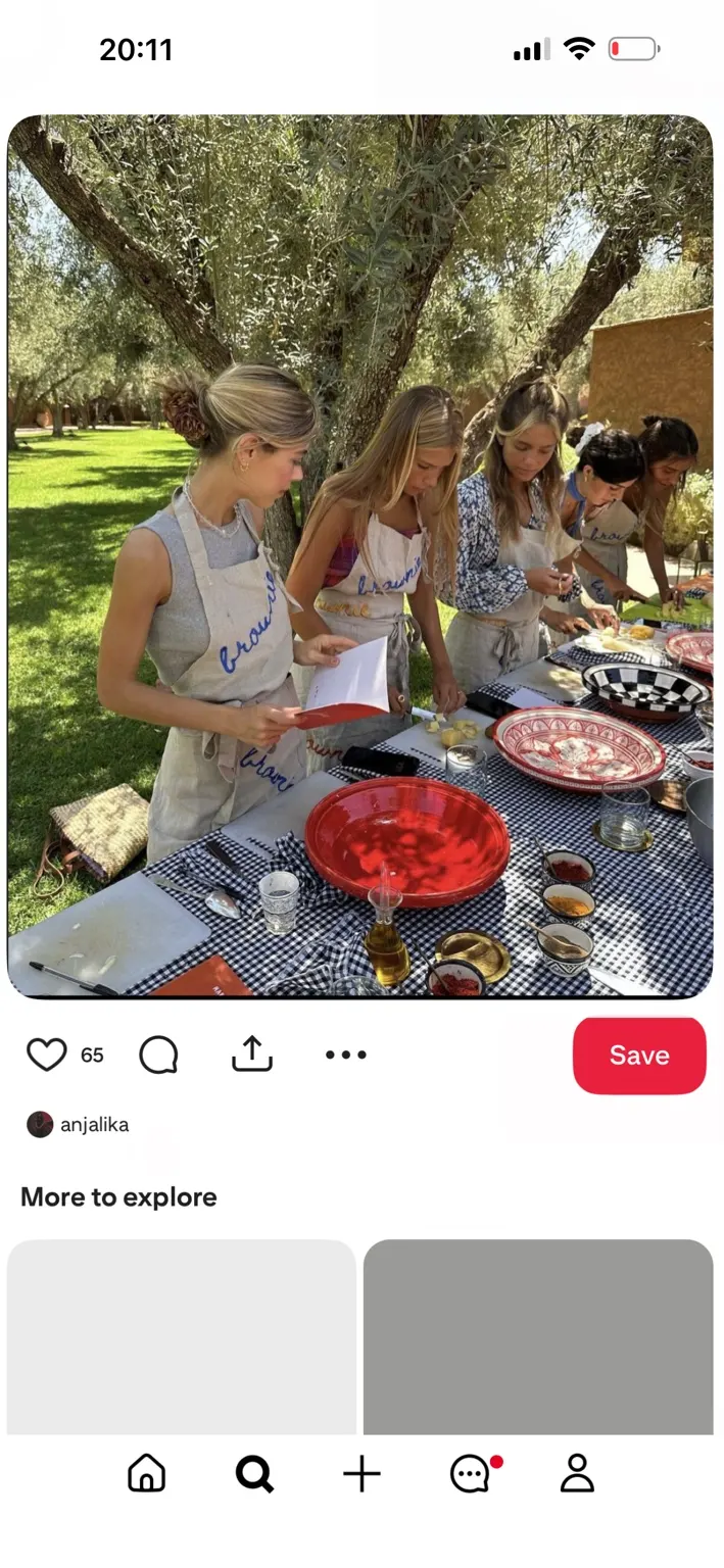 Friends cooking together at a garden table