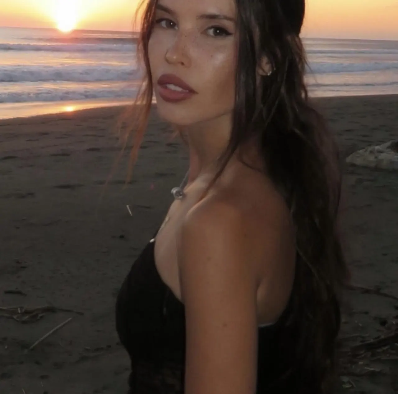 Kara on the beach at sunset